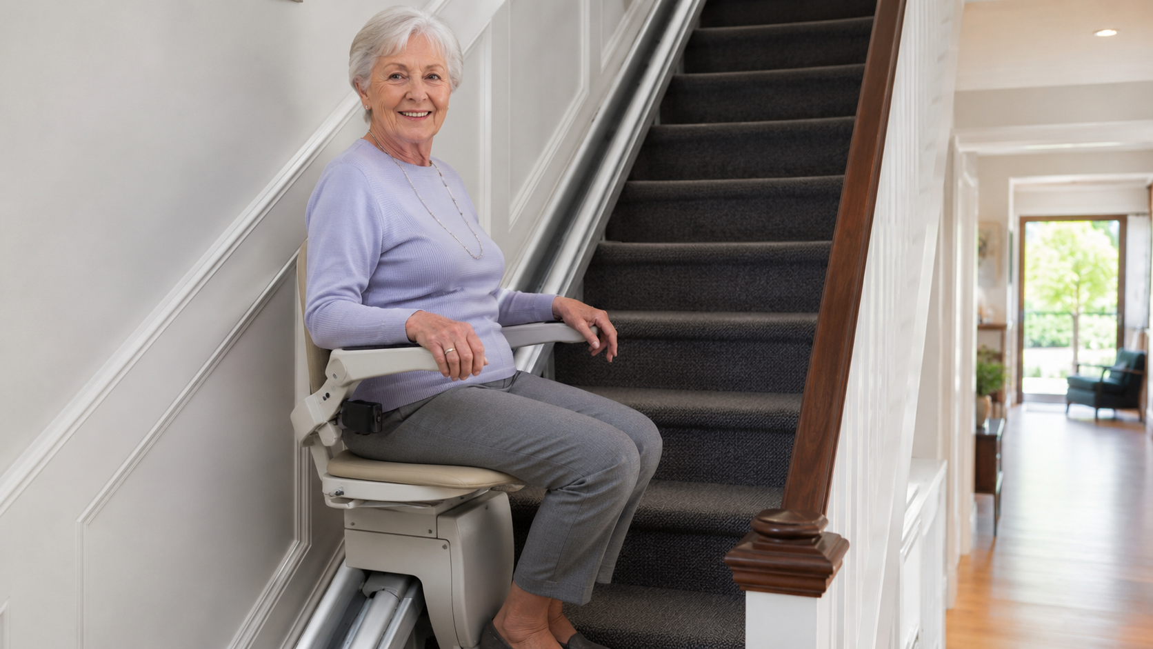 Senior woman using a modern curved stairlift in her home